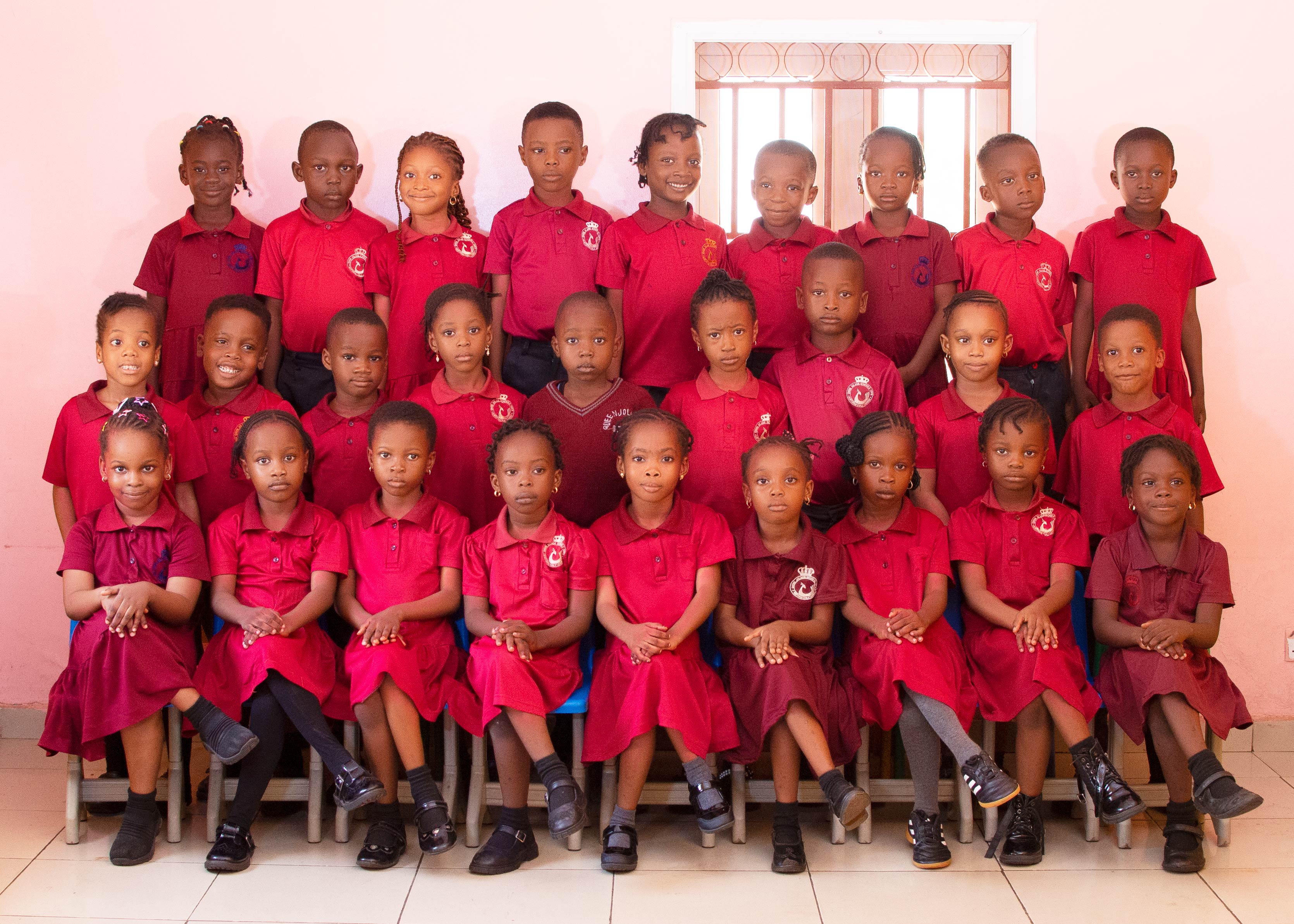 Reception class pupils of Queen Jolade Schools in school uniform